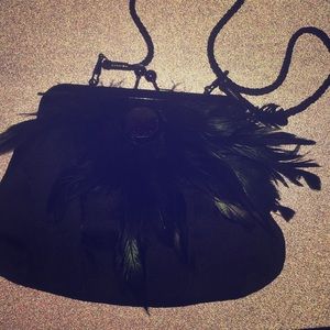 Black clutch with feathers and rhinestones
